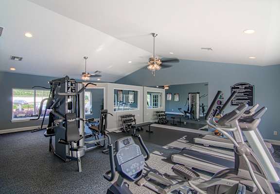the gym at the enclave at woodbridge apartments in sugar land, tx