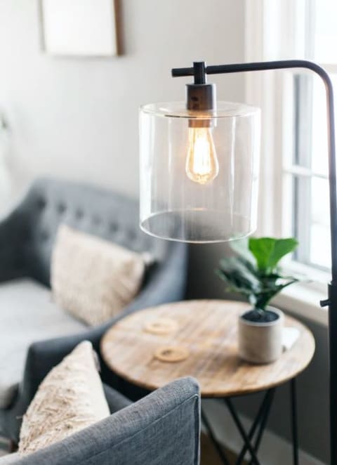 a living room with a couch and a table