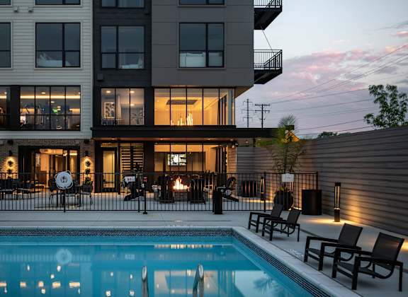 The Flats is a modern apartment complex with a pool.