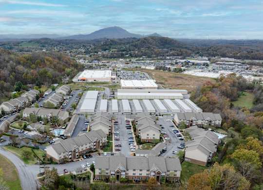 Apartments in Sevierville for Rent – Overlook at Allensville -   An aerial view of a our community with moutains in the background