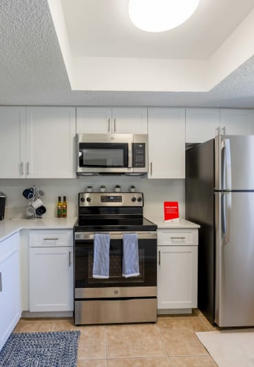 the preserve at ballantyne commons apartment kitchen with stainless steel appliances