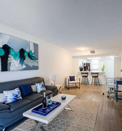 a living room with a couch and a table