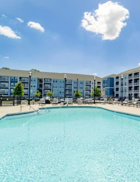 our apartments have a large swimming pool with lounge chairs