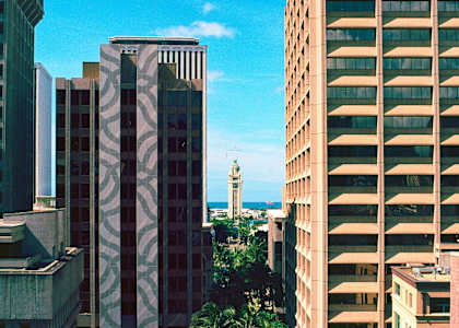 a view of the city with the water in the background