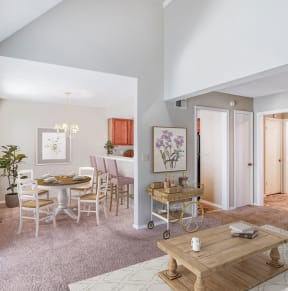 a kitchen with bar stools and a counter top with