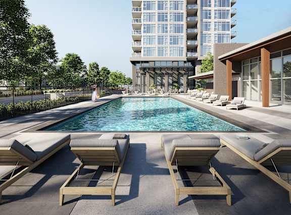 a rendering of a pool at a hotel with lounge chairs