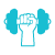 A pixelated image of a person sitting at a desk.