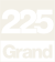 A number 225 with a background of a city skyline.