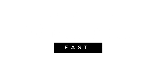a white sign that says call place 8 washington east