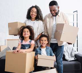 A family of four is moving into a new home.