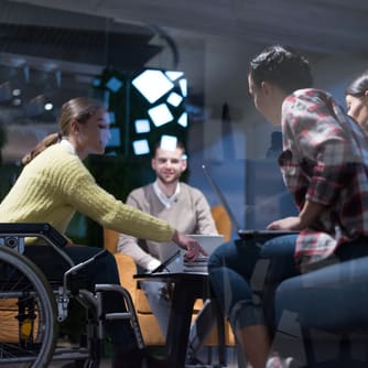 Four people sitting around a table