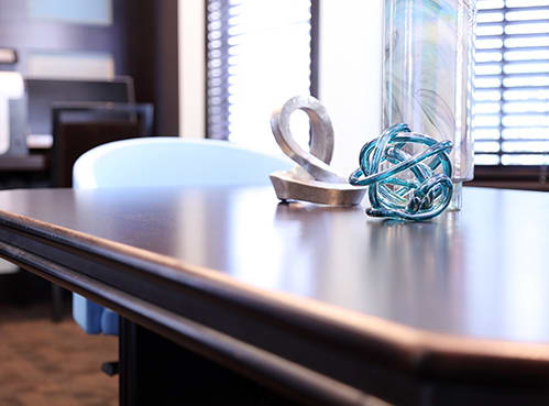 a knot on a table next to a dining room table at Regency Place, Oakbrook Terrace, IL, 60181