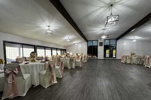 a large banquet room with tables and chairs