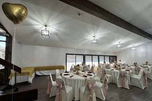 a banquet room with tables and chairs
