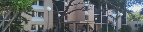 Casa Santa Marta I Senior Apartments in Sarasota, FL lush landscaping and well-kept exteriors