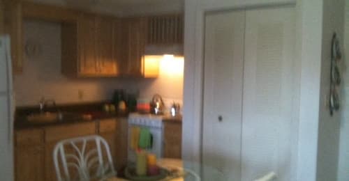 kitchen and dining area in apartment at Casa Santa Marta II Senior Apartments in Sarasota, FL