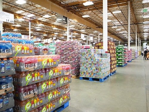 a supermarket aisle filled with lots of packages of food