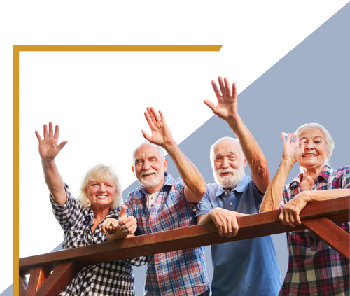 Four elderly people standing on a balcony with their hands raised.