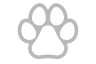 A white paw print on a black background at The Villages Apartment of Bayan Grove in Boynton Beach, FL