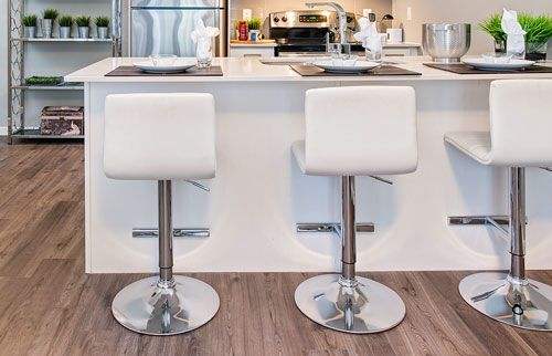 Modern kitchen with large island with seating for 3
