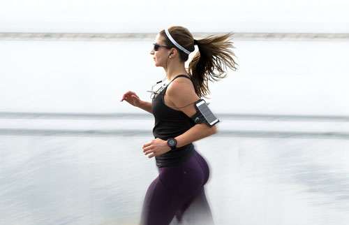 Woman going for a jog in the local neighbourhood