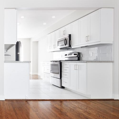 Well-appointed kitchen with stainless steel appliance package.