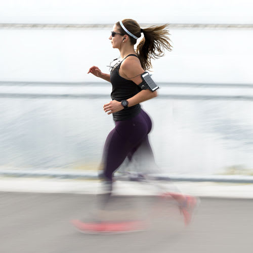 Woman going for a jog in the local neighbourhood