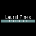 a white logo on a black background with the words laurel pines apartments
