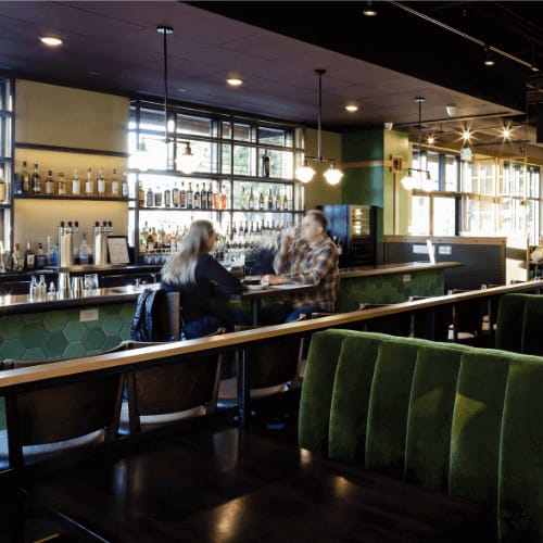people sitting at a bar at Harbor Heights 55+ Community, Olympia, 98501