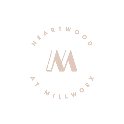 a logo for heartwood art willow