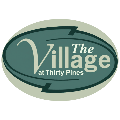 The logo for The Village at Thirty Pines.
