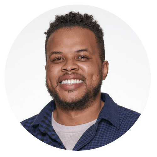 a portrait of a man smiling with a