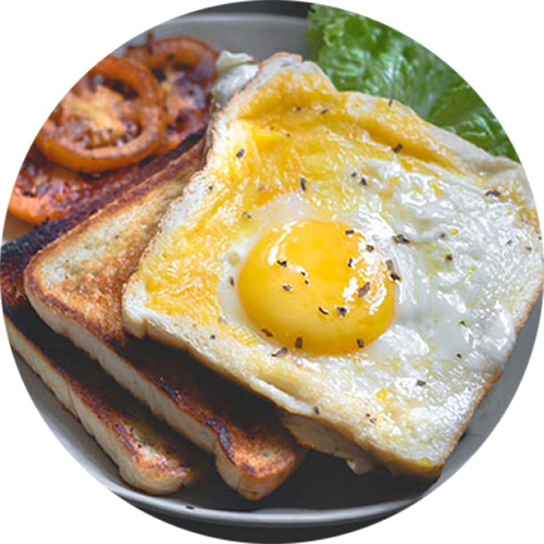 a plate of eggs and toast on a table