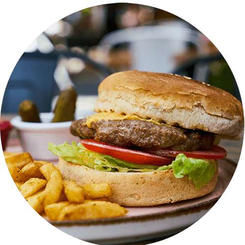 a hamburger and fries on a plate
