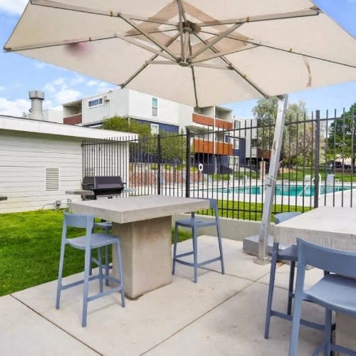 Hudson at Highline Apartments in Denver, Colorado Patio with BBQ's and Seating