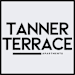 A sign that says Tanner Terrace Apartments.
