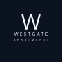 a logo for westgate apartments on a white background