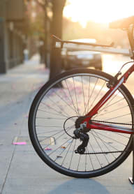a bike parked on the side of a road