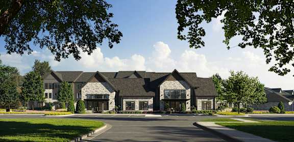 Building exterior with greenery at Wrenley Luxury Apartment Homes, Newnan, Georgia