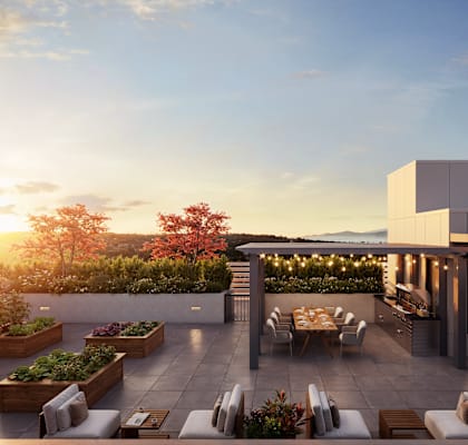 A modern house with a patio and outdoor furniture.