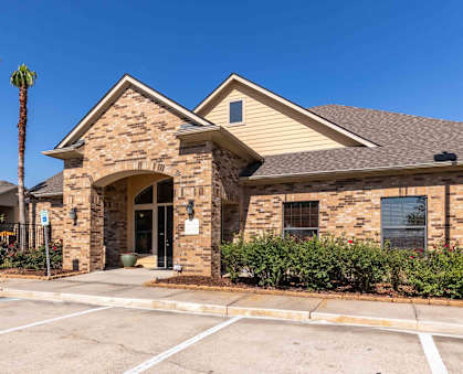 Sugar Mill Apartments in Addis, LA photo of front of the leasing office