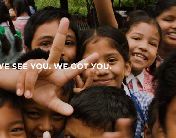 a group of children pose for a photo with the words we see you, we got you