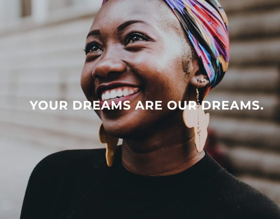 a woman with a headscarf on and the words your dreams are our dreams