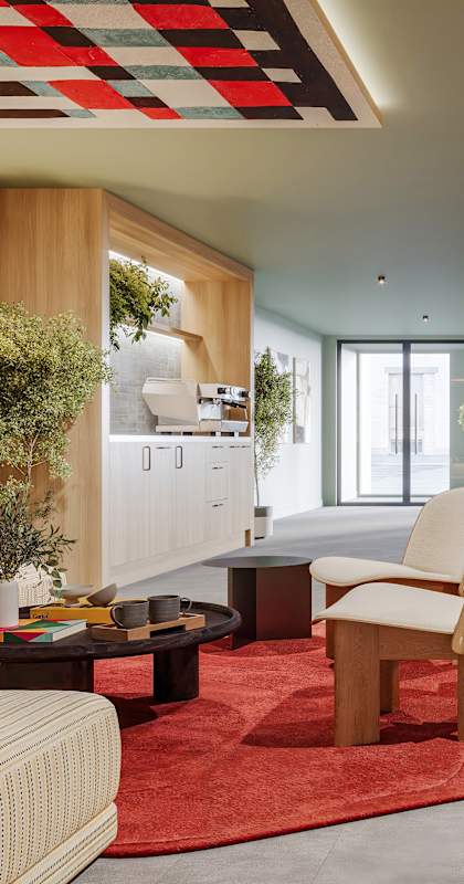 A modern living room with a red rug and wooden furniture.
