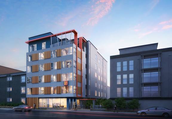 a rendering of a building on a city street