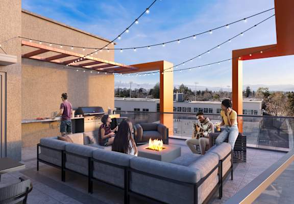 a rendering of a rooftop patio with a fire pit and people sitting around it