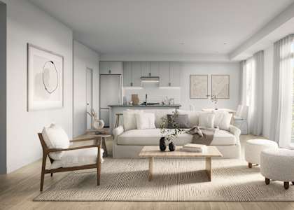 a white living room with a couch and a table