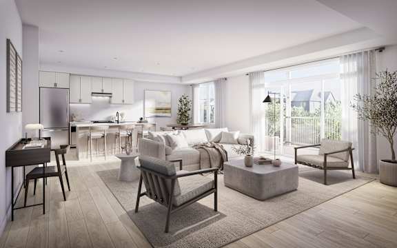 A modern living room with a kitchen area in the background.