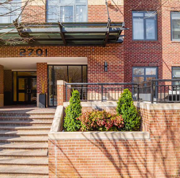 Luxury Apartment Building Exterior Entrance | The Barton at Woodley DC