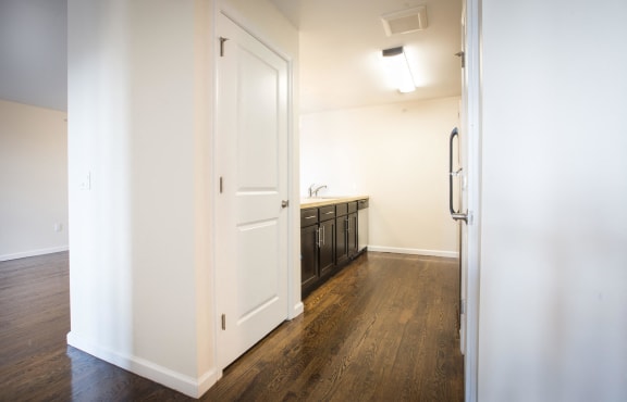 Hallway into kitchen and pantry
